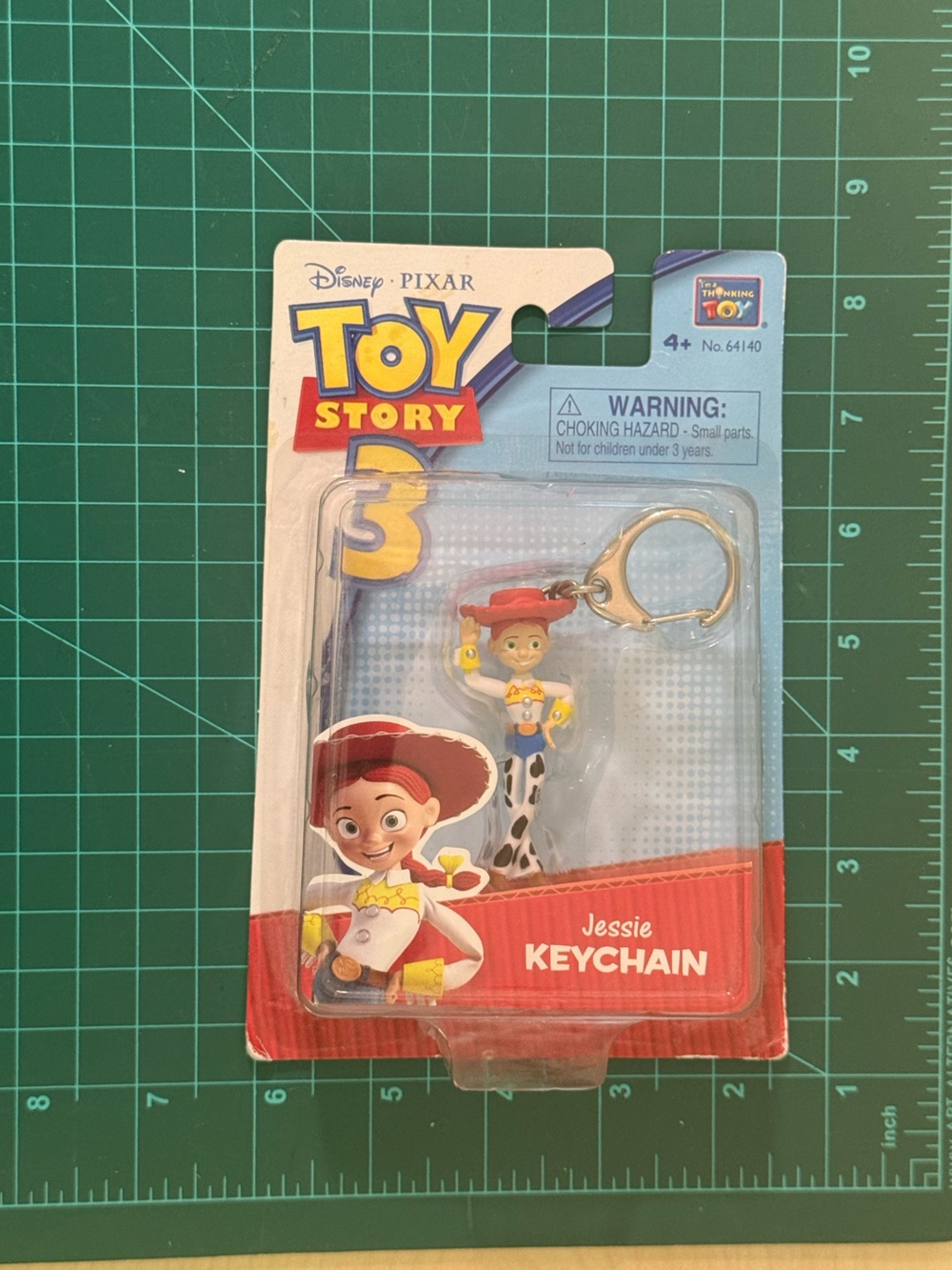 Disney Jessie Keychain - Red, White, Yellow, Blue